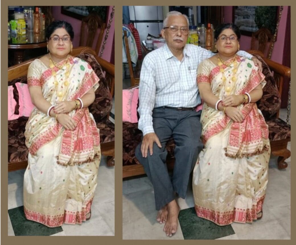 A lifelike silicone memorial sculpture of a woman in a cream and red sari, shown first on its own and then seated beside an older man in a domestic living room.