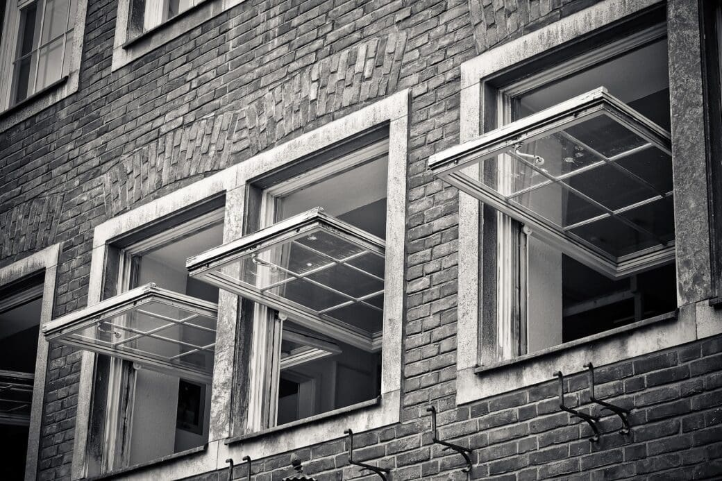 A row of windows on an upper floor.